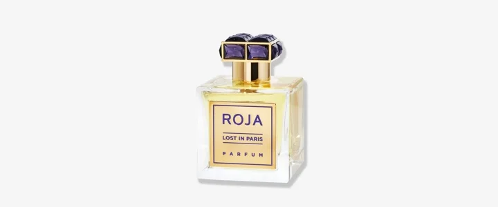 Roja Lost in Paris — četvrtasta staklena bočica sa zlatnom etiketom i ljubičastim kristalnim čepom